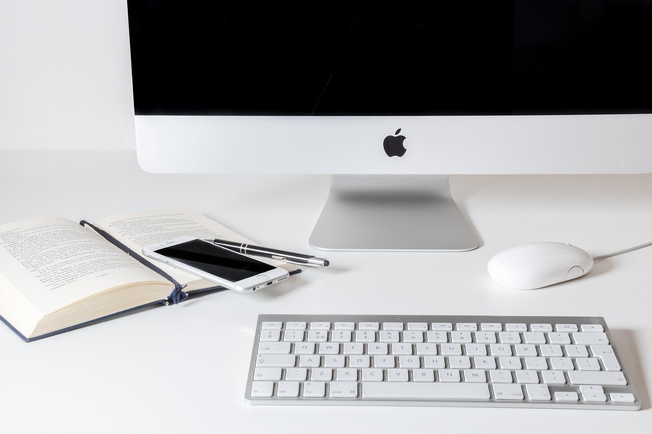 Work, computer, apple — Protecting Sensitive Data: What You Should Consider Before Sharing Any Type of Document